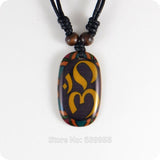 Om Buddhist India resin Amulet